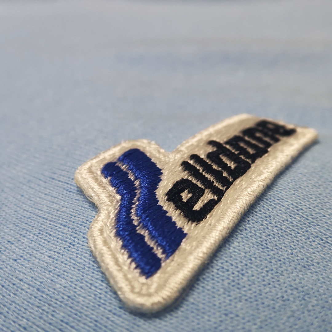 WE11D0NE Embroidered Logo Simple Color T-Shirt